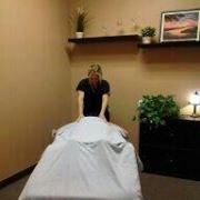 Lisa, one of our many fabulous massage therapists on staff using her healing hands on another satisfied patient!