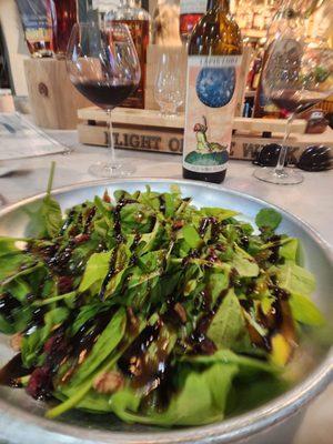 Joyful Salad, spinach, dried cranberries, goat cheese, and the most delicious balsamic