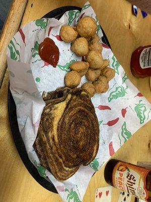 Patty melt and fried mushrooms with a shiner bock peach.  Like sucking a jolly rancher while drinking a beer LOL