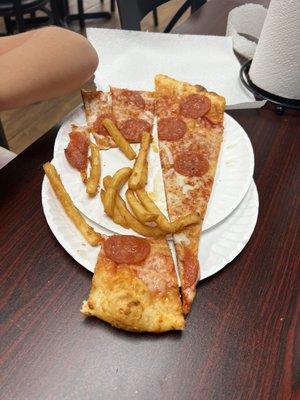 Kids pizza they cut one slice in half