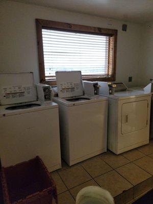 laundry room two washers only one dryer working