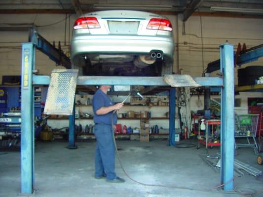 John doing custom exhaust work