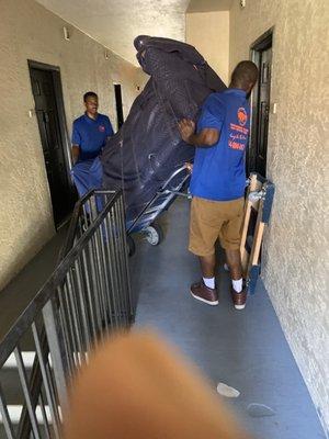 Movers at work!! Stairs are no problem!!