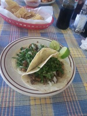 Tacos flour tortillas steak and AL pastor