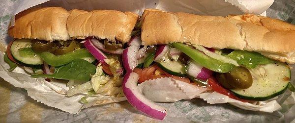 Sweet Onion Chicken Teriyaki on Artisan Italian-toasted  provolone, lettuce, spinach, tomato, cucumber, green peppers, red onions, jalapeños