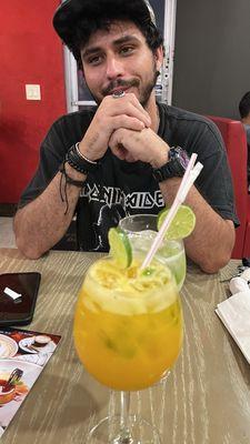 My kid with his lemonade and my mango lemonade.