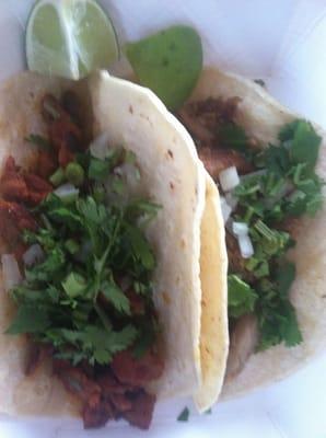 Al pastor and carnitas tacos