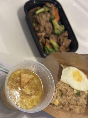 Egg Drop Soup (Bowl), Hot and Sour Soup* (Bowl) (not shown), BBQ Pork Egg Fried Rice with BBQ pork, and Beef Stir Fried and Broccoli