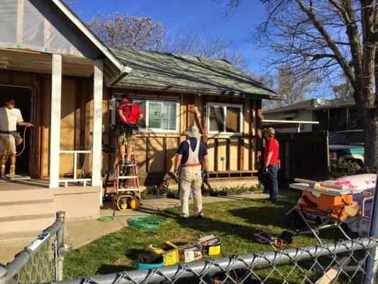 Replacing roofing, flooring, windows, and doors