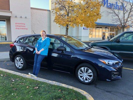 Our daughter, ecstatic at the delivery in Moscow, Idaho, of her new Impreza.