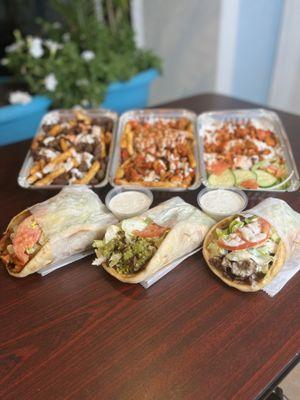 Lamb loaded fries !
chicken over rice plater !
chicken loaded fries !
Fish gyro wrap !
Falafel gyro wrap !
Lamb Gyro