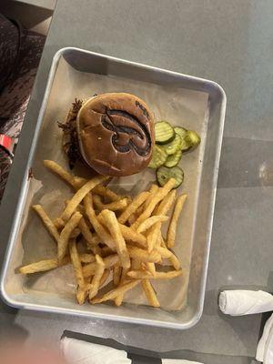 Pulled pork sandwich with fries