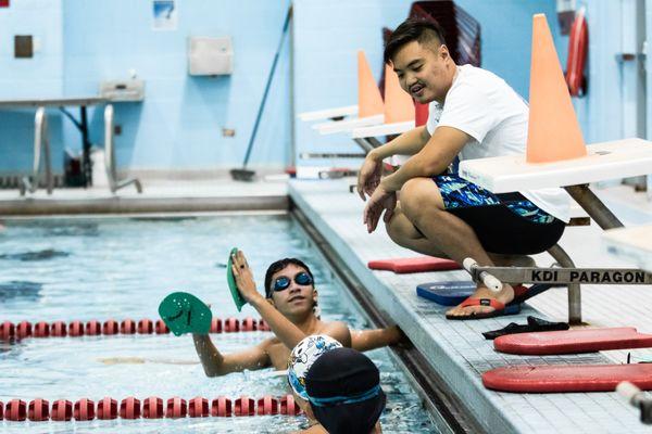 Coach Al working with advanced swimmers.