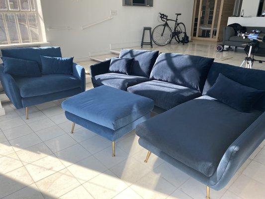 The "blue velvet" couch and chair / ottoman that the company claims to be the same color are in fact incredibly different hues