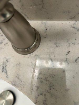 Cracked quartz countertop when removing old faucet handle