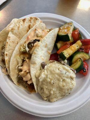 Grilled fish tacos with 2 sides of mashed potatoes and seasonal veggies