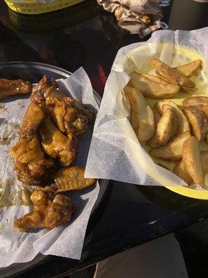 Teriyaki wings and wedge fries