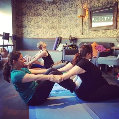 Cassie Fireman (co-founder) doing thai body work at Soul Fit Saturday workshop, Press Tea. West Village, NYC