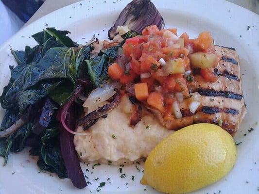 Grilled salmon on garlic mash potatoes and veggies