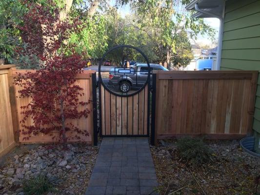 Custom iron and cedar walk gate