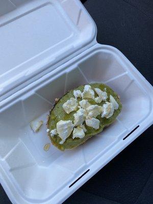 Avocado toast with honey and goat cheese