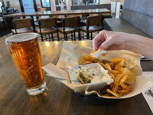 House made kettle chips with the sauteed onion dip & honey ale