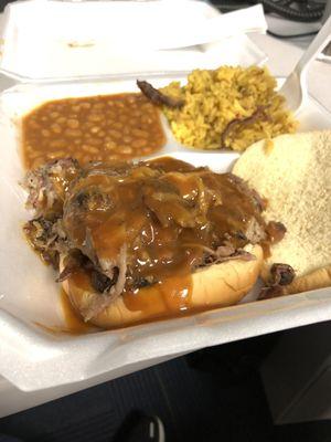 Bbq pulled pork sandwich, baked beans , rib-tip perlo rice