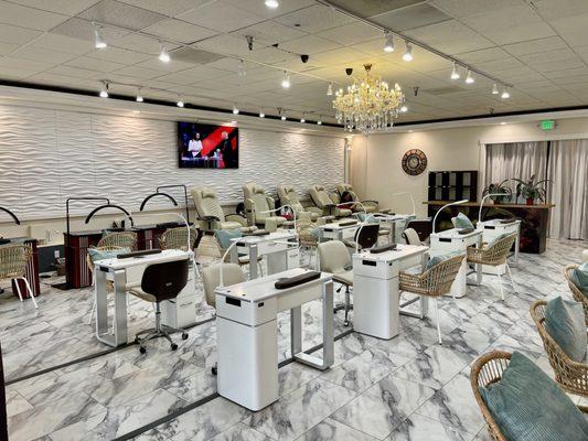 10 pedicure chairs and 14 manicure tables to service you.