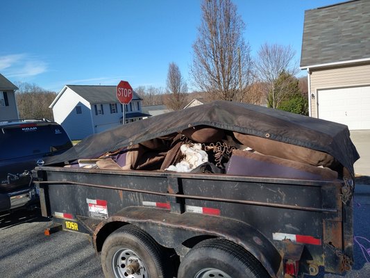 One dump trailer full of a customer's service n Winston Salem, Nc junk fom thier junk removal service call