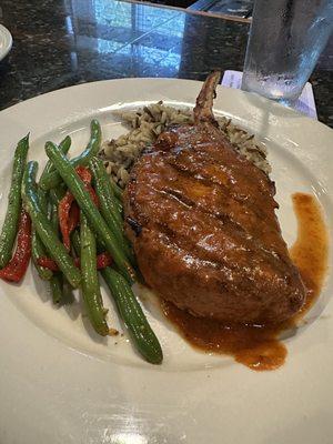 Amazing pork chop rubbed with chipotle/adobo with wild rice and green beans. Everything excellent!