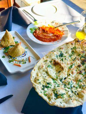 Vegetable Samosa  , Garlic Naan and Butter Chicken.