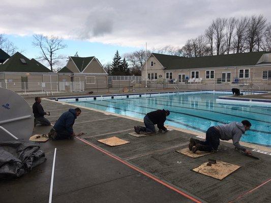 Masonry team finishing the new deck.