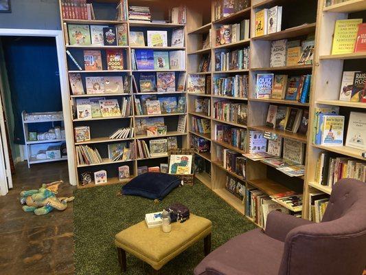 Children's  section welcomes the kiddos while mama puts her feet up!  See the changing table behind?