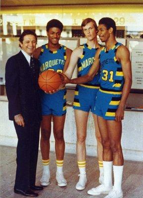 Al McGuire, Maurice Lucas, Mike Mills, and Larry McNeill.