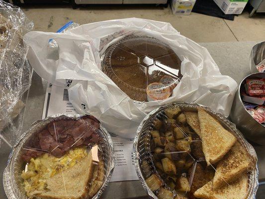 My order. This is two meals. Salmon cakes with home fries and toast. The other order is three pancakes with eggs and Turkey bacon.