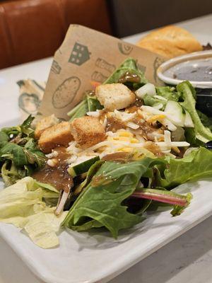 Close-up of the House Salad with balsamic vinaigrette salad dressing.