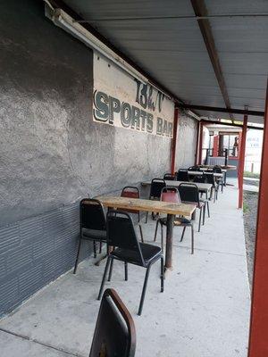 Front outside patio. Not completely done. There will be more picnic tables outside.