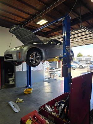 350z track edition. Massive oil leak from camshaft adjusters. Also performed a major tune up