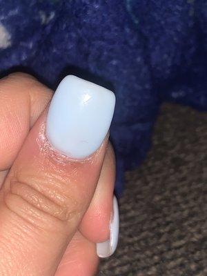 My daughter wanted almond or coffin shaped nails with a blue French manicure.