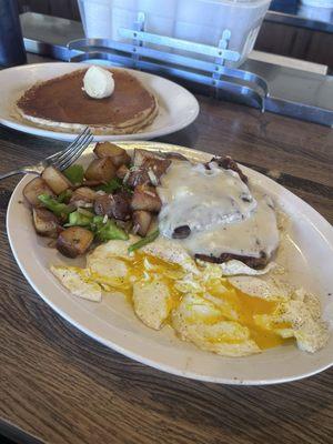 A very good pancake chicken, fried steak country potatoes with bell pepper and onions eggs are easy