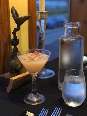 Rose Petal mock-tini with a view+local iron art.