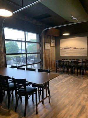 Dining area with garage door to deck