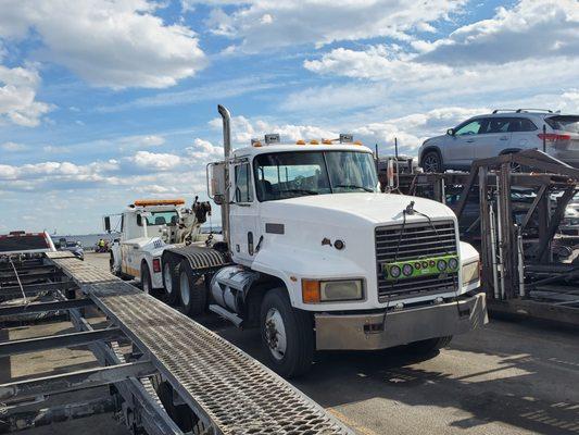 truck jump starting, towing, and battery replacing