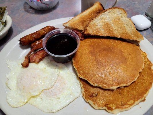 Breakfast: pancakes eggs, sausage and bacon.