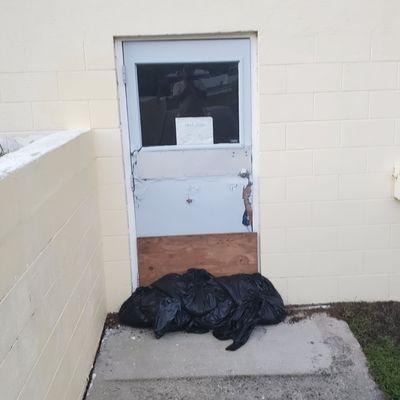 Entrance to the rec room, still sandbags from Hurricane Idalia almost a month ago.