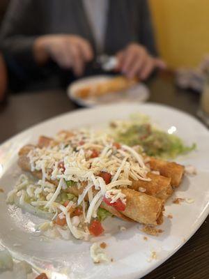 Flautas half chicken half beef surprisingly very good definitely recommend trying