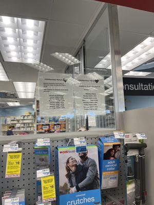 sign stating the pharmacy hours match business hours, yet they closed 2 hours early.