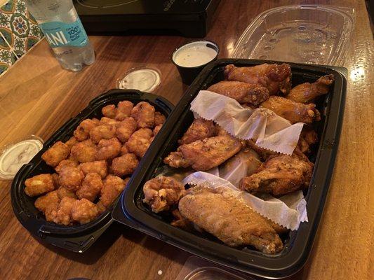 Tater tots, 18 Wing Meal (garlic parm (towards you), west texas mesquite, mango habanero (right of the blue cheese)