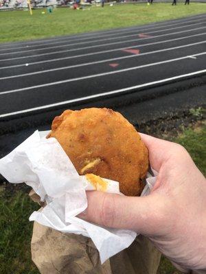 The surprisingly tasty cheese wheel, which is nothing more than a hamburger patty with cheese, breaded and deep-fried.