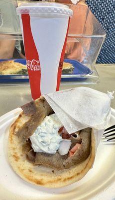 Gyro (with everything, e.g., tzatziki, onions, tomatoes) and pillowy pita bread